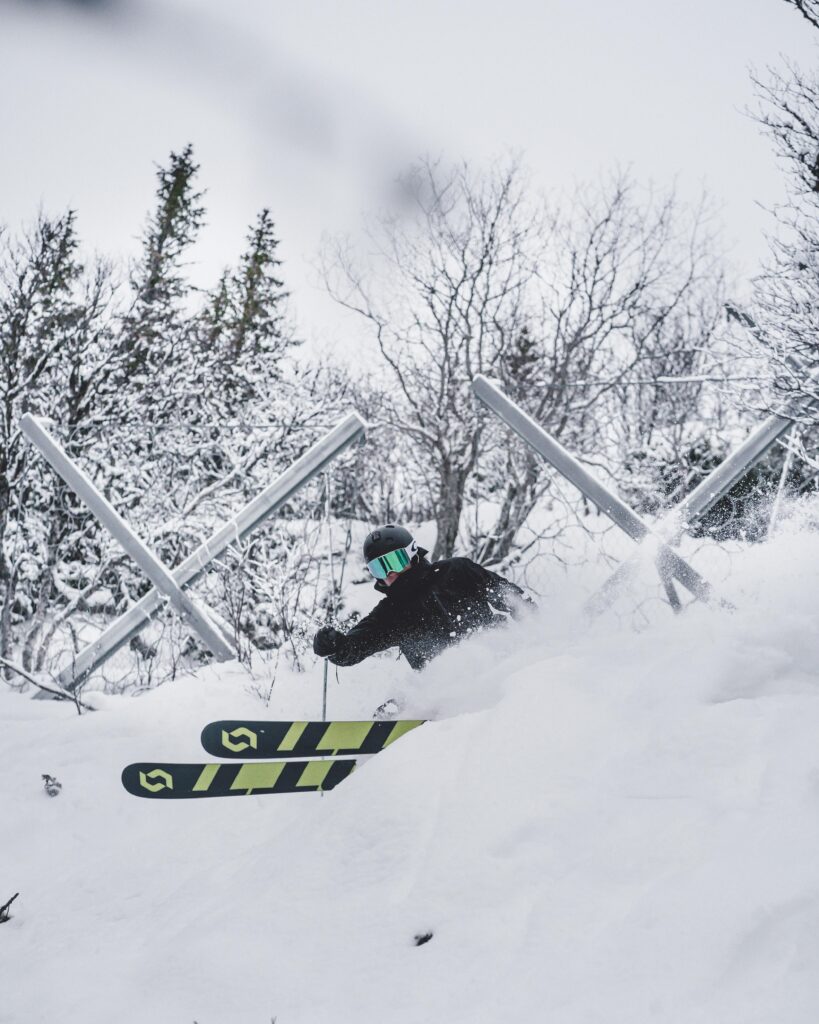 A thrilling winter skiing scene in snowy Jämtland, Sweden.